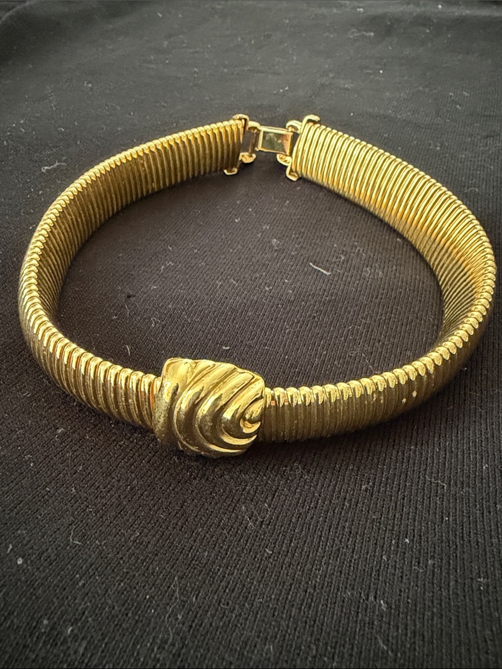 Gold-tone Ribbed Choker Necklace with Sculpted Center Accent